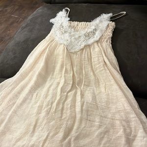 Could be used as a long shirt or a mini dress